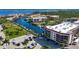 This property offers waterfront access with community tennis courts and a condo with a parking area at 25188 Marion Ave # A206, Punta Gorda, FL 33950
