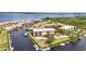 Waterfront condos with convenient boat docks amidst lush green landscaping at 25188 Marion Ave # A206, Punta Gorda, FL 33950