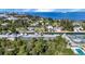 This aerial view highlights the property's location near boat storage and tennis courts at 25188 Marion Ave # A206, Punta Gorda, FL 33950