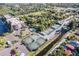 Aerial view of tennis courts, swimming pool, condos, boat slips and parking at 25188 Marion Ave # A206, Punta Gorda, FL 33950