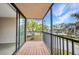Balcony view with sliding glass door providing access to the interior space at 25188 Marion Ave # A206, Punta Gorda, FL 33950