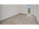 Bright bedroom with carpet flooring and views of the waterway at 25188 Marion Ave # A206, Punta Gorda, FL 33950