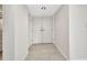 Double front doors with a tile floor entry and neutral colored walls at 25188 Marion Ave # A206, Punta Gorda, FL 33950