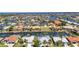 Canal-front homes featuring private docks, screened pools, and manicured landscapes with beautiful waterfront access at 2718 Saint Thomas Dr, Punta Gorda, FL 33950