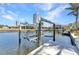 This waterfront home offers easy access to the water with a private boat lift on the serene canal at 2718 Saint Thomas Dr, Punta Gorda, FL 33950