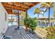 This home has a wonderful outdoor area with a spiral staircase leading to a private deck overlooking the canal at 2718 Saint Thomas Dr, Punta Gorda, FL 33950