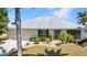 Landscaped front exterior with a well-lit facade in a desirable neighborhood at 2718 Saint Thomas Dr, Punta Gorda, FL 33950