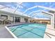 Lovely screened-in pool featuring clean blue water and ample space for relaxation on the surrounding patio at 2718 Saint Thomas Dr, Punta Gorda, FL 33950