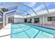Enjoy the lovely screened in pool for relaxing swims and outdoor fun on the patio with this inviting backyard at 2718 Saint Thomas Dr, Punta Gorda, FL 33950