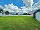 Large, well-maintained backyard featuring a sturdy privacy fence, providing a secure and private outdoor space at 3324 Port Charlotte Blvd, Port Charlotte, FL 33952