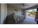 Comfortable bedroom with closet and sliding glass doors to the outdoor patio at 384 Viedma St, Punta Gorda, FL 33983
