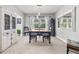 Formal dining room featuring a dining table, an antique cabinet, and natural light at 384 Viedma St, Punta Gorda, FL 33983