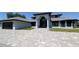 Stunning two-story home featuring a grand entrance and paver driveway at 384 Viedma St, Punta Gorda, FL 33983