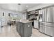 Modern kitchen featuring stainless steel appliances, granite countertops, and a central island at 384 Viedma St, Punta Gorda, FL 33983