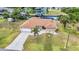 Beautiful aerial view of this home and its waterfront location with a boat dock with convenient access to the water at 4473 Sweetbay St, Port Charlotte, FL 33948