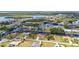 Overhead shot of a canal-front community boasting serene waterways and beautiful landscaped residences at 4473 Sweetbay St, Port Charlotte, FL 33948