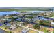 Sprawling aerial of homes on canals offering waterways and lovely landscaping, creating a picturesque waterside community at 4473 Sweetbay St, Port Charlotte, FL 33948