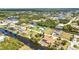 Beautiful aerial view of waterfront homes in a residential community with boat docks along canals at 4473 Sweetbay St, Port Charlotte, FL 33948