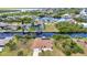 Aerial shot of a home, positioned perfectly for waterway access with private boat dock and pool at 4473 Sweetbay St, Port Charlotte, FL 33948