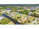 Picturesque aerial of waterfront properties, showcasing scenic canals, private docks, and lush landscaping at 4473 Sweetbay St, Port Charlotte, FL 33948