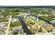 Picturesque aerial view showcases waterfront homes with private docks nestled among serene canals and lush greenery at 4473 Sweetbay St, Port Charlotte, FL 33948