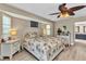 Comfortable bedroom featuring a ceiling fan and lots of natural light at 4473 Sweetbay St, Port Charlotte, FL 33948