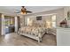 Comfortable bedroom featuring sliding glass doors leading to the pool area at 4473 Sweetbay St, Port Charlotte, FL 33948
