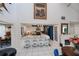 Open layout offers a modern kitchen with an island, white cabinets, and stainless steel appliances at 5061 San Rocco Ct, Punta Gorda, FL 33950