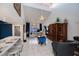 Bright living room features high ceilings, tile floors, and comfortable seating at 5061 San Rocco Ct, Punta Gorda, FL 33950