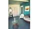 Welcoming porch with mirror, Singer sewing machine, and wicker seating at 535 Lindley Ter, Port Charlotte, FL 33952