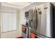 Kitchen with stainless steel appliances, white cabinets, and ample counter space at 558 Azalea Drive, Port Charlotte, FL 33952