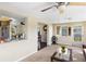 Open-concept living area with view into kitchen and dining space at 558 Azalea Drive, Port Charlotte, FL 33952