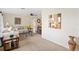 Inviting living room with comfortable seating, a stylish coffee table, and plenty of natural light at 558 Azalea Drive, Port Charlotte, FL 33952