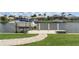 Waterfront backyard with a private boat dock and lift perfect for enjoying waterfront living and boating at 571 Port Bendres Dr, Punta Gorda, FL 33950