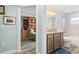 Well-lit bathroom featuring a vanity with granite countertop, bathtub, and shower at 571 Port Bendres Dr, Punta Gorda, FL 33950