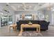 Beautifully appointed living room featuring stylish furniture, wood-look tile flooring, and a relaxing atmosphere at 571 Port Bendres Dr, Punta Gorda, FL 33950