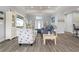 Comfortable living room with tray ceiling, plenty of natural light, and an open layout, perfect for relaxation at 571 Port Bendres Dr, Punta Gorda, FL 33950