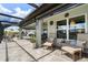 Enjoy outdoor living on this patio, with comfortable seating and views of the pool at 571 Port Bendres Dr, Punta Gorda, FL 33950
