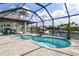 Enjoy a private screened-in pool area, perfect for relaxing and entertaining with waterfront views at 571 Port Bendres Dr, Punta Gorda, FL 33950