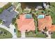 Overhead view of a waterfront home featuring a pool, manicured lawn, and boat dock access at 584 Toulouse Dr, Punta Gorda, FL 33950