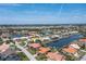 Gorgeous community aerial view of waterfront homes along intersecting canals with boat access at 584 Toulouse Dr, Punta Gorda, FL 33950