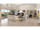 Spacious living room features tile floors, high ceilings, and views of the pool area at 584 Toulouse Dr, Punta Gorda, FL 33950