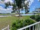 Relax on this back porch with tranquil views of the community lake at 749 Watersedge St, Englewood, FL 34223