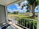 Relax on this back porch with tranquil views of the community lake at 749 Watersedge St, Englewood, FL 34223