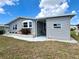 Well-maintained single-story home with landscaping, and covered entry at 749 Watersedge St, Englewood, FL 34223