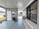 A functional laundry room with abundant cabinet and counter space at 749 Watersedge St, Englewood, FL 34223