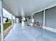 Spacious covered patio with ample seating, perfect for enjoying the outdoors at 749 Watersedge St, Englewood, FL 34223
