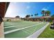 Enjoy outdoor recreation on these well-maintained shuffleboard courts under a bright, sunny sky at 749 Watersedge St, Englewood, FL 34223