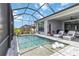 Inviting pool area with lush landscaping and scenic water views at 8968 Artisan Way, Sarasota, FL 34240