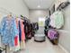 Spacious walk-in closet with ample storage and organization solutions at 8968 Artisan Way, Sarasota, FL 34240